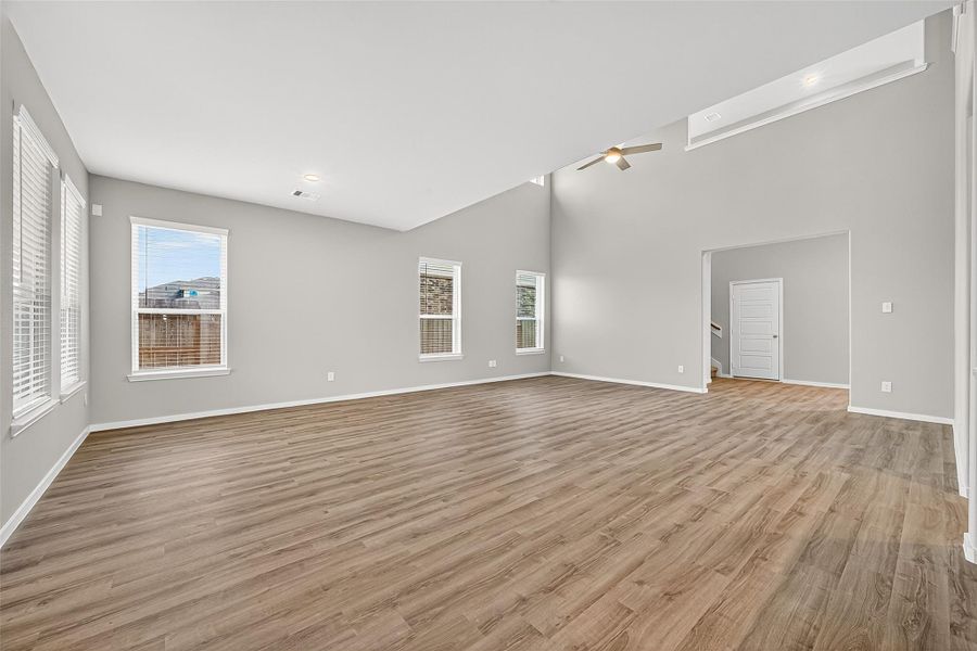 Spacious, unfurnished interior of a new home in Sunterra, Katy (Image 27).