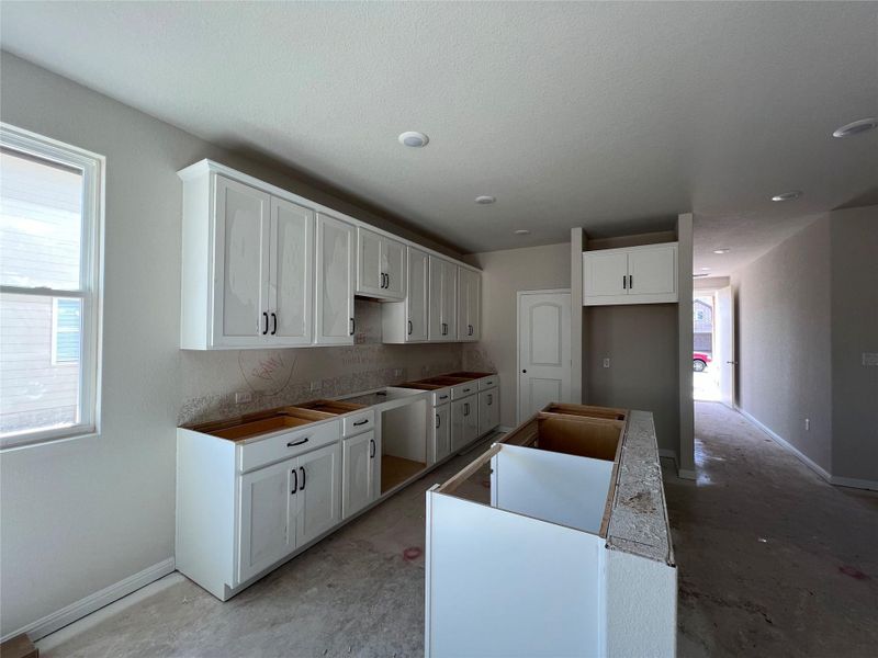 Furnished interior view inside a new home in Rolling Glen, Hutto (Image 5).