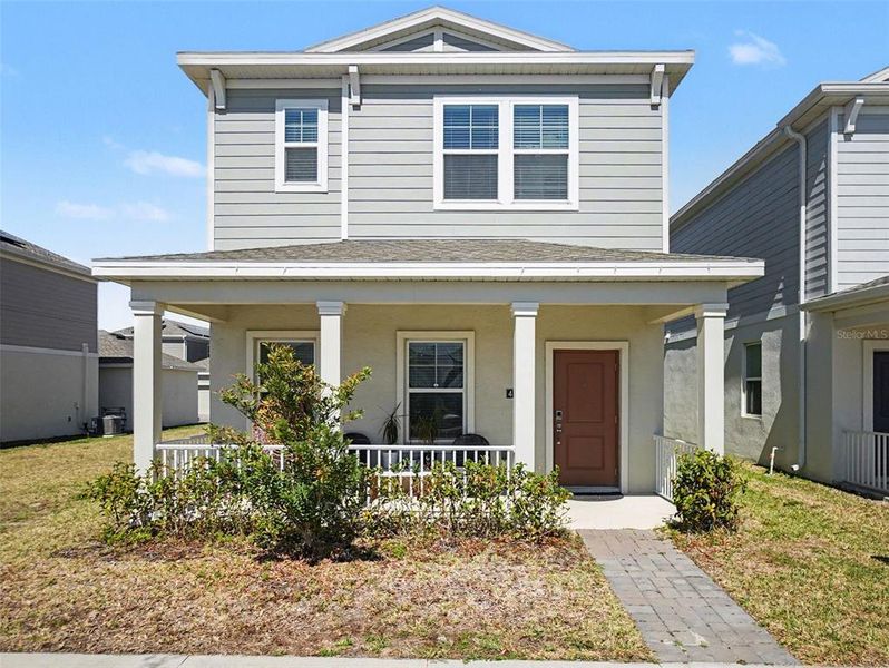 Front exterior of a new home in , Apopka, FL, highlighting curb appeal (Image 1). Front exterior of a new home in , Apopka, FL, highlighting curb appeal (Image 1).