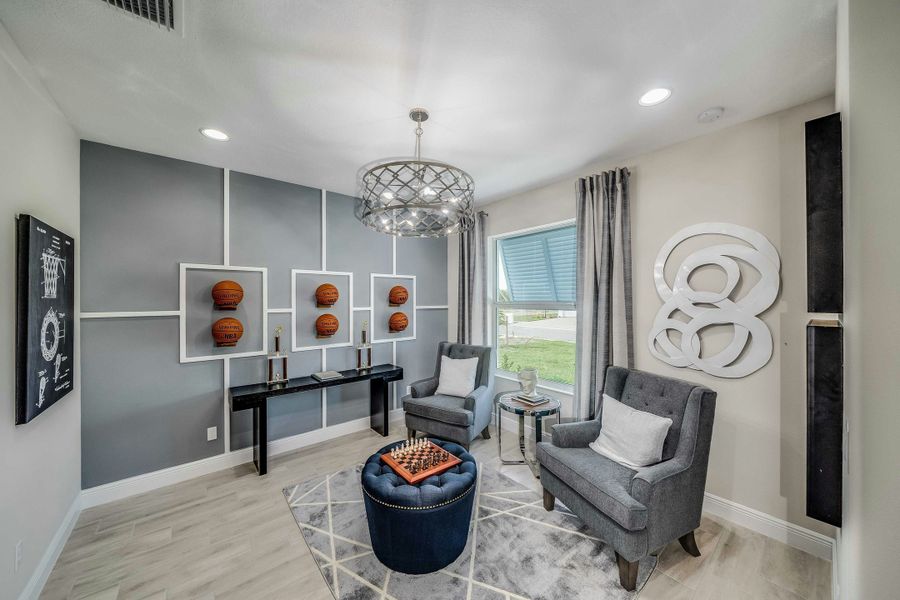 Representative furnished interior of a home built from the Allura by GHO Homes in High Pointe, Vero Beach (Image 9).