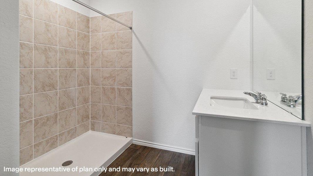 A well-appointed bathroom with a spacious walk-in shower and elegant vanity. A well-appointed bathroom with a spacious walk-in shower and elegant vanity.