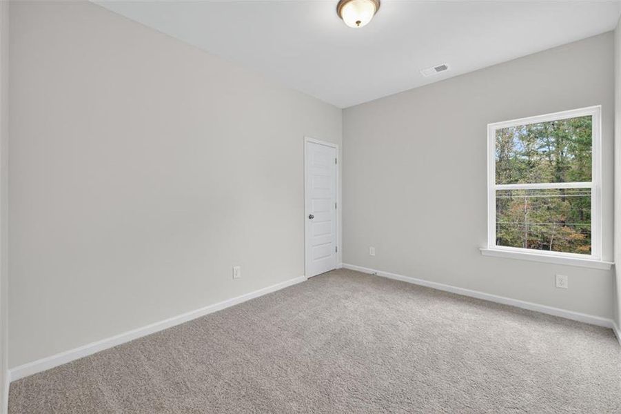 Spacious, unfurnished interior of a new home in Garrett Preserve, Douglasville (Image 22).