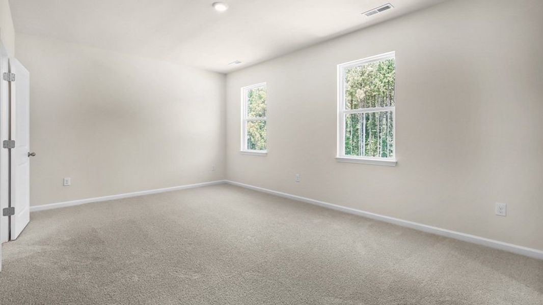 Spacious, unfurnished interior of a new home in The Townes at Madden West, Fuquay Varina (Image 14).