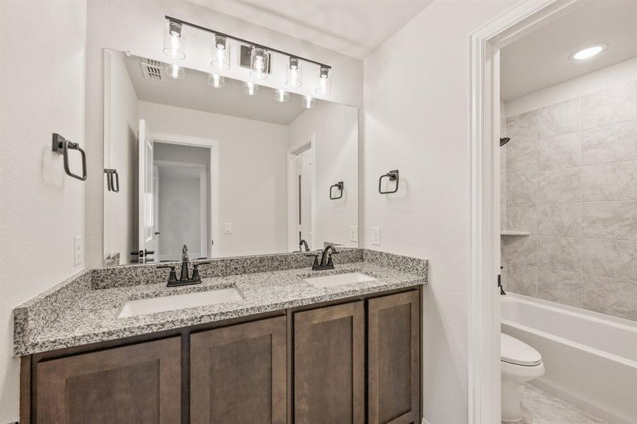 Furnished interior view inside a new home in Hulen Trails Classic 50, Fort Worth (Image 17). Furnished interior view inside a new home in Hulen Trails Classic 50, Fort Worth (Image 17).