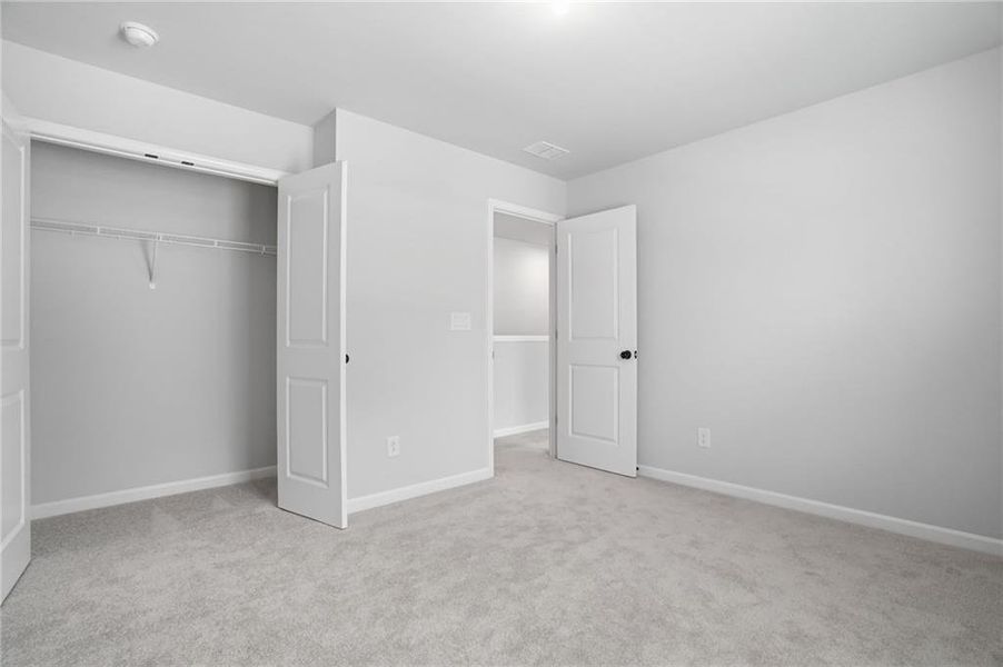 Spacious, unfurnished interior of a new home in Berkeley Mill, Cumming (Image 32).