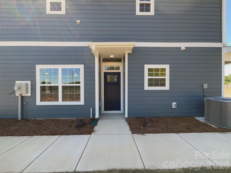 Exterior details and patio area of a home in Pine Trace, Gastonia (Image 3).