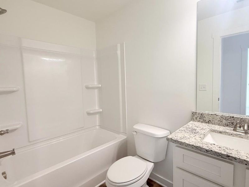 Furnished interior view inside a new home in Sutton’s Landing, Statham (Image 7).