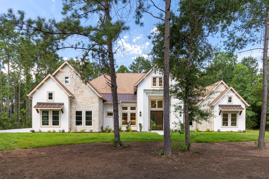 Front exterior of a new home in , Montgomery, TX, highlighting curb appeal (Image 26).