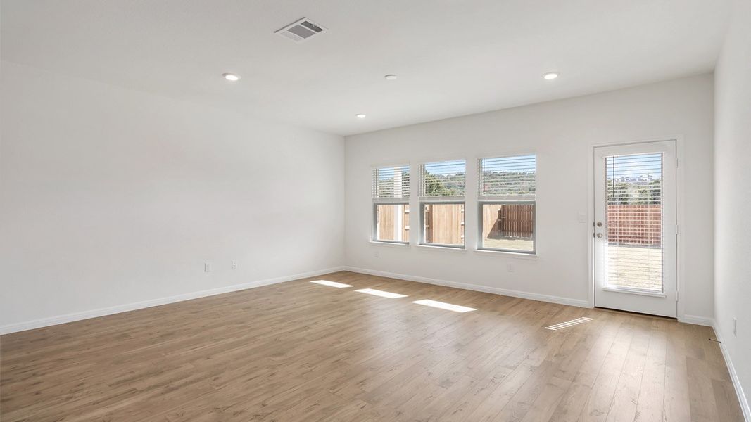 Spacious, unfurnished interior of a new home in Bar W Ranch, Leander (Image 12).