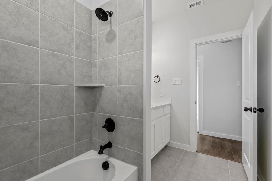 Representative furnished interior of a home built from the Garrison II by Cheldan Homes in Arbor Oaks, Boyd (Image 21).