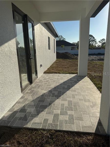 Exterior details and patio area of a home in , Lehigh Acres (Image 4).