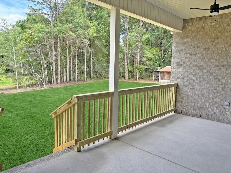 Exterior details and patio area of a home in Young Oaks, Crestview (Image 3).
