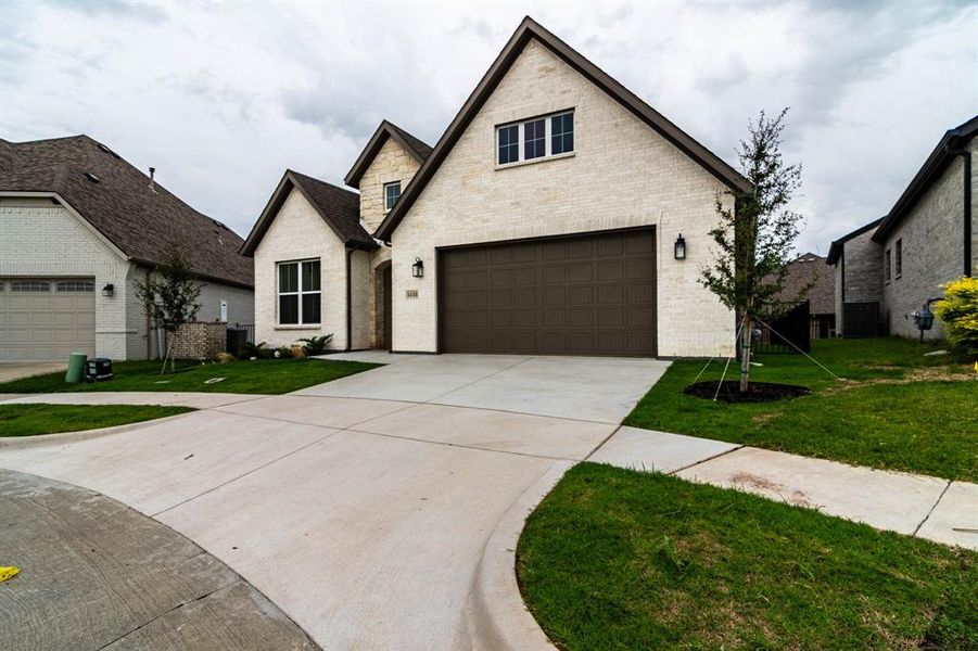 Front exterior of a new home in , Heath, TX, highlighting curb appeal (Image 24).