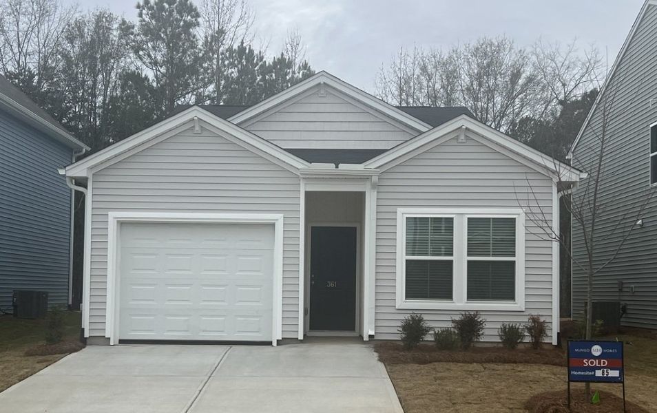 Front exterior of a new home in Braxton Place, Moore, SC, highlighting curb appeal (Image 1).