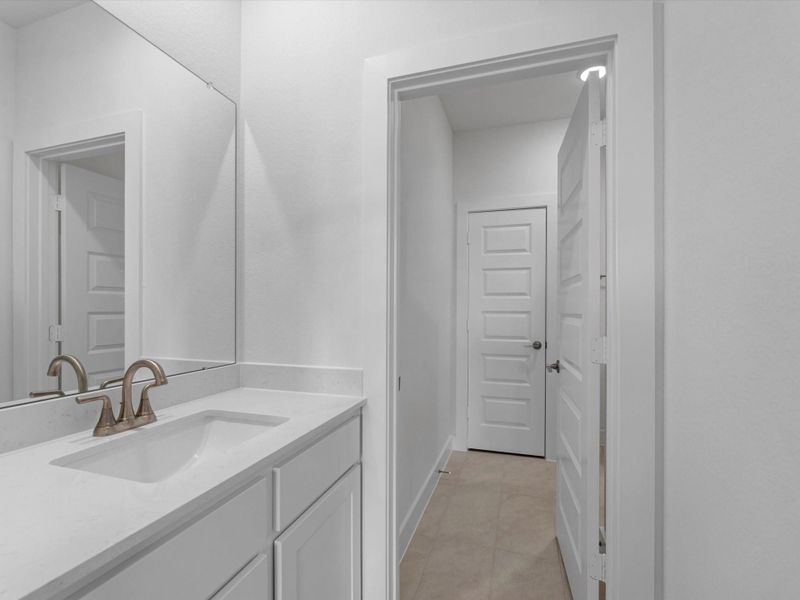 Furnished interior view inside a new home in Woodson’s Reserve, Spring (Image 12).