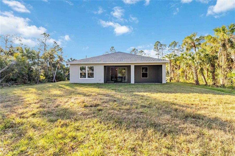 Exterior details and patio area of a home in , North Port (Image 26).