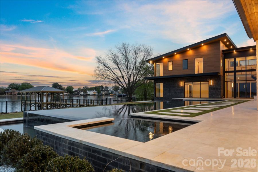 60’ Double Infinity Edge Saltwater Lap Pool w/ Cabo Shelf & Integrated Hot Tub