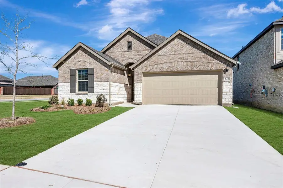 Front exterior of a new home in Forest Park, Princeton, TX, highlighting curb appeal (Image 2). Front exterior of a new home in Forest Park, Princeton, TX, highlighting curb appeal (Image 2).