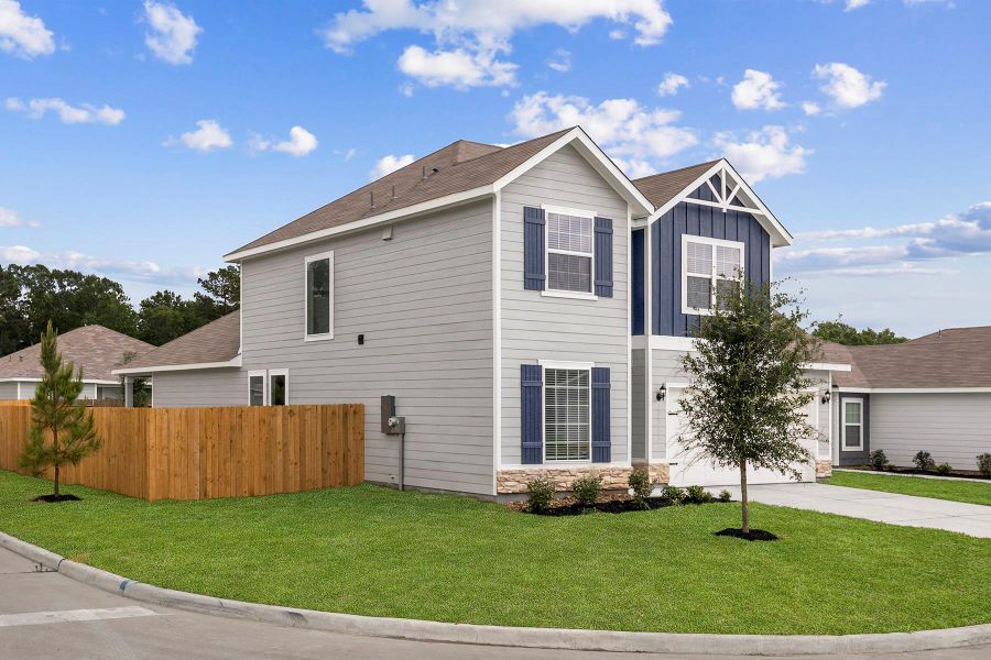 Front exterior of a new home in Trails at Cochran Ranch, Waller, TX, highlighting curb appeal (Image 2). Front exterior of a new home in Trails at Cochran Ranch, Waller, TX, highlighting curb appeal (Image 2).