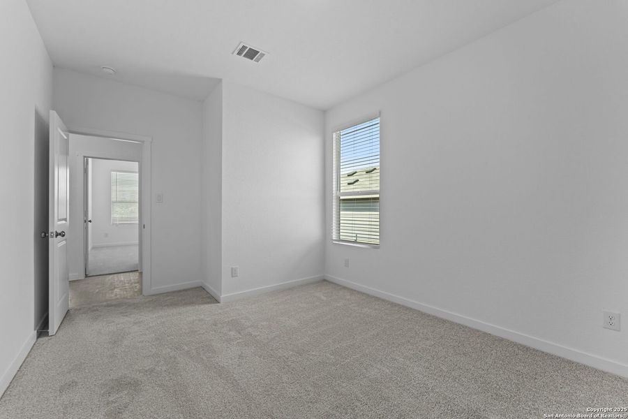Spacious, unfurnished interior of a new home in Waterwheel: Coastline Collection, San Antonio (Image 18).