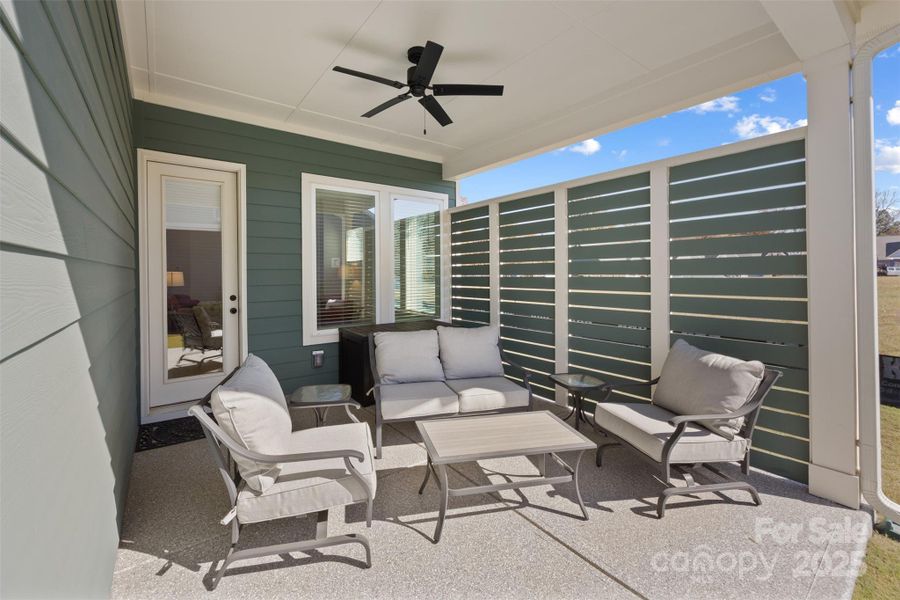 cOVEREDD PORCH IN THE REAR OF THE HOUSE