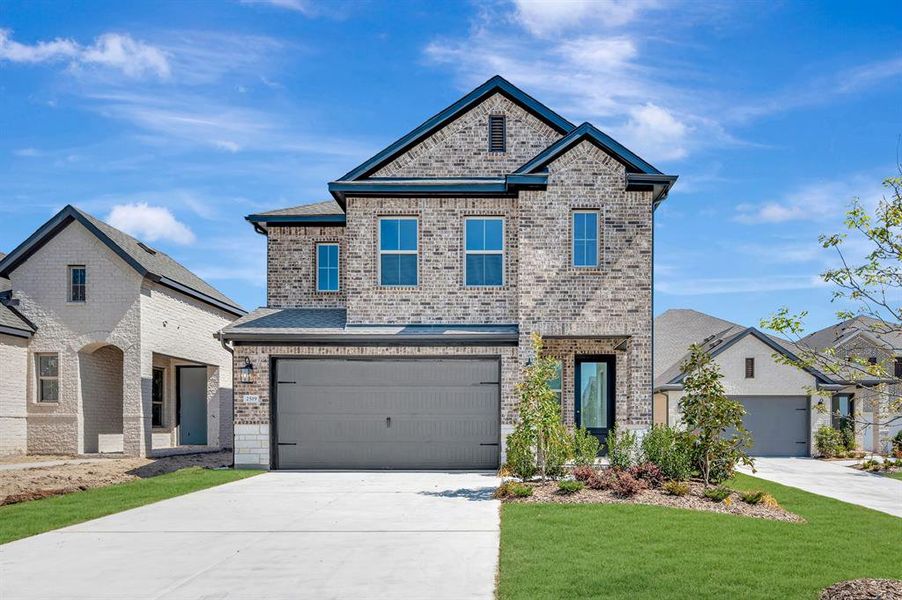 Front exterior of a new home in Heath Golf & Yacht Villas, Heath, TX, highlighting curb appeal (Image 1). Front exterior of a new home in Heath Golf & Yacht Villas, Heath, TX, highlighting curb appeal (Image 1).