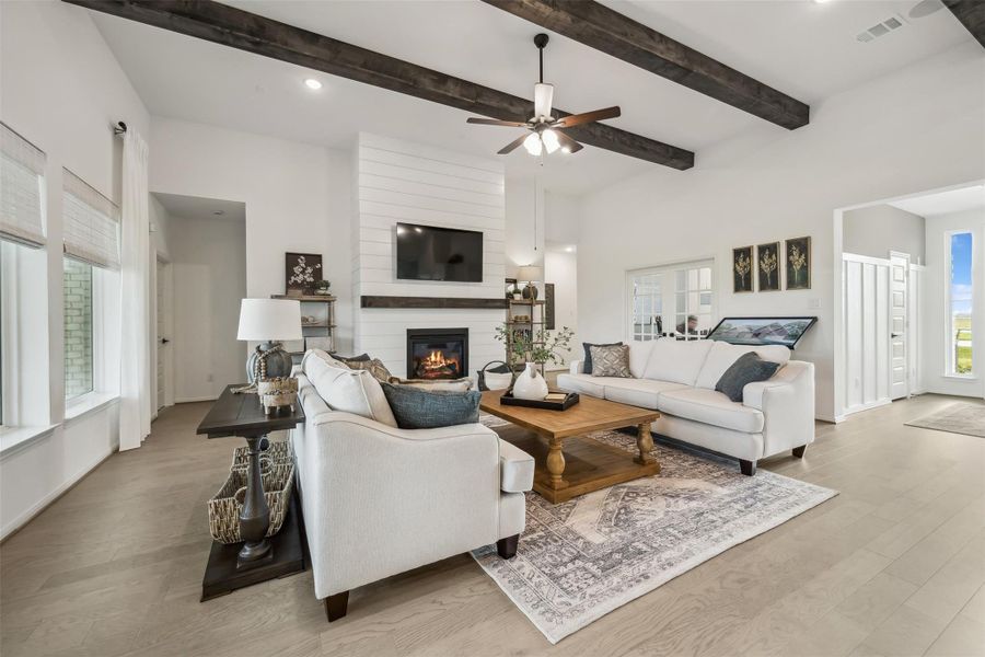 Cozy great room with fireplace (*Photo not of actual home and used for illustration purposes only.)