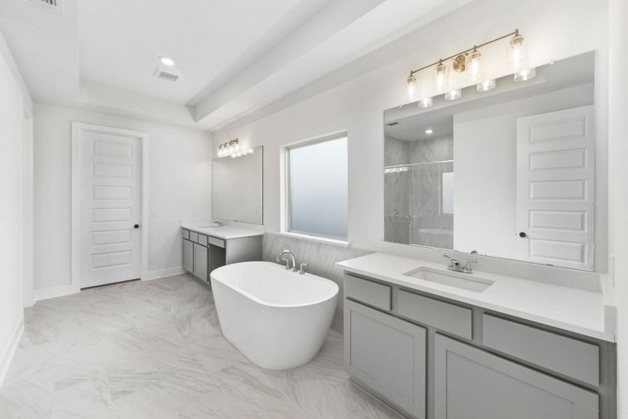 Furnished interior view inside a new home in The Colony, Bastrop (Image 9).
