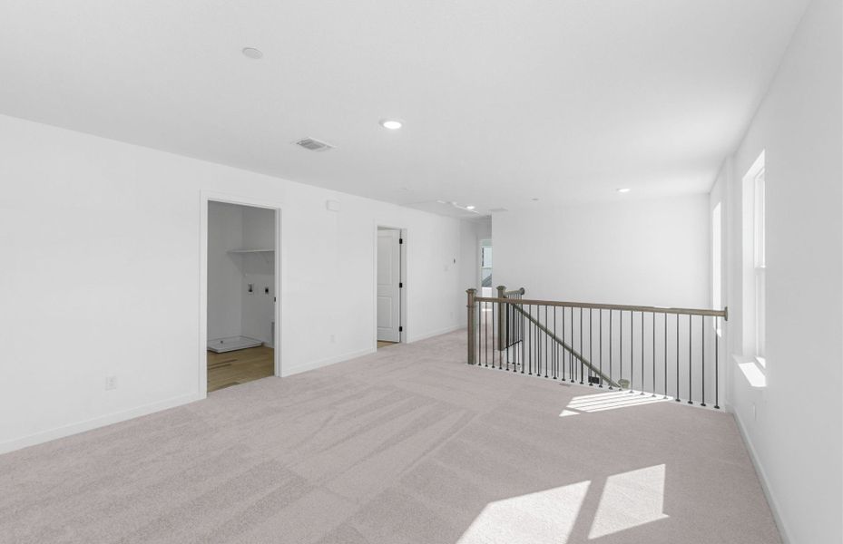 Spacious, unfurnished interior of a new home in Monarch on Main, Round Rock (Image 24). Spacious, unfurnished interior of a new home in Monarch on Main, Round Rock (Image 24).