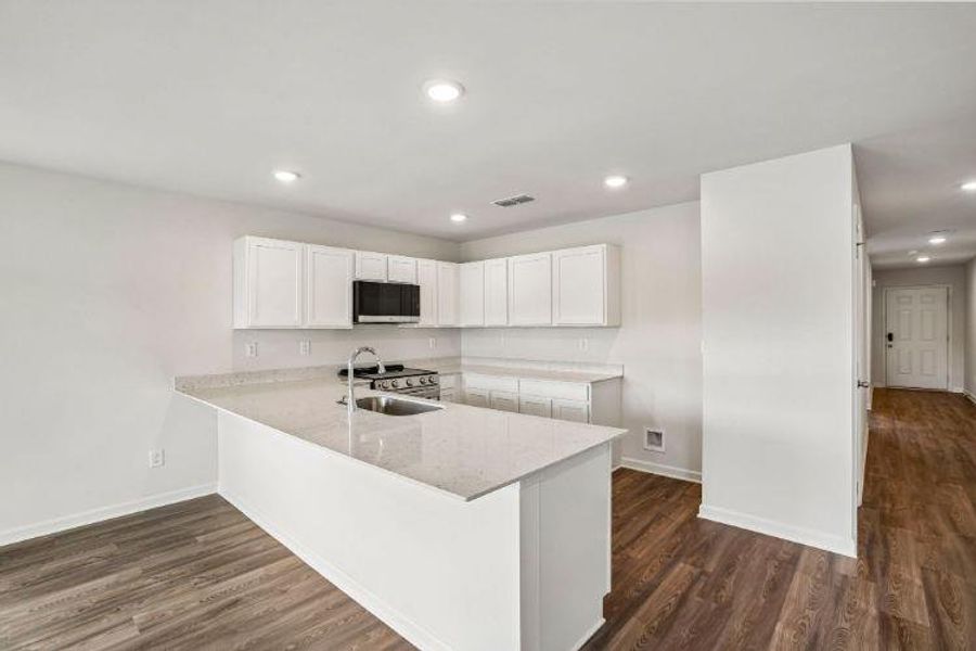 Furnished interior view inside a new home in Urban's Place, Chatsworth (Image 7).