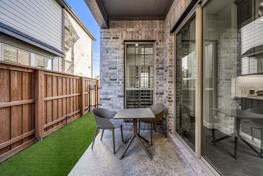 Exterior details and patio area of a home in Fields Villas - Darling Homes, Frisco (Image 21). Exterior details and patio area of a home in Fields Villas - Darling Homes, Frisco (Image 21).