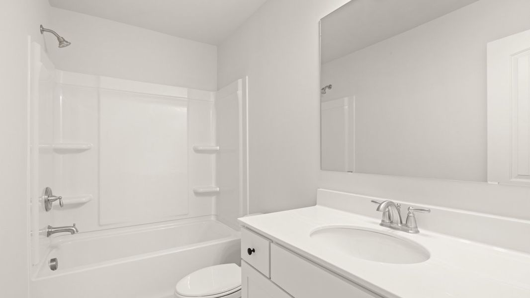 Representative furnished interior of a home built from the Grayson by D.R. Horton in Holland Estates, Powder Springs (Image 12).