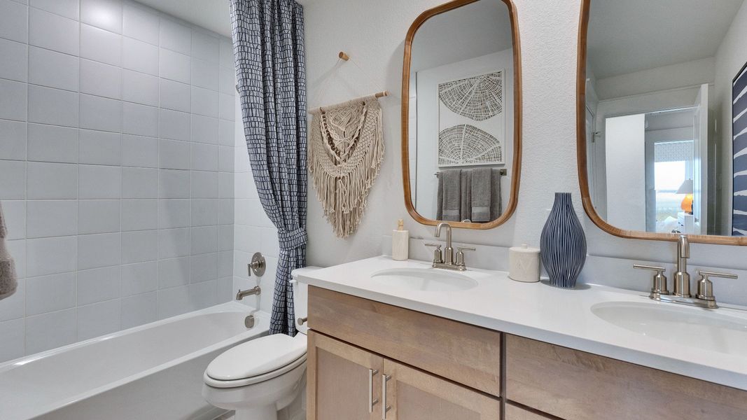 Representative furnished interior of a home built from the Meyerson by DRB Homes in Infinity Square, Kyle (Image 47).