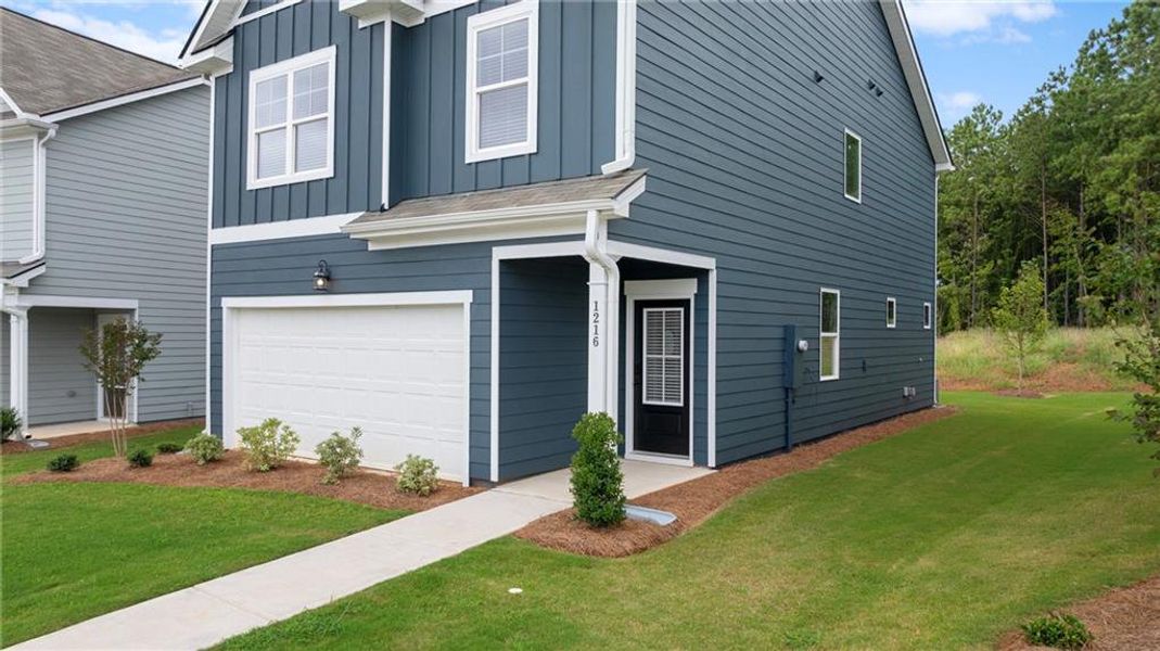Front exterior of a new home in Walden Park – The Retreat, Jonesboro, GA, highlighting curb appeal (Image 25).