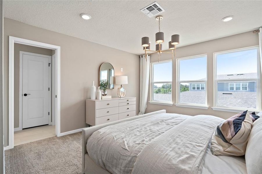 Furnished interior view inside a new home in Parkside Trails, Clermont (Image 8).
