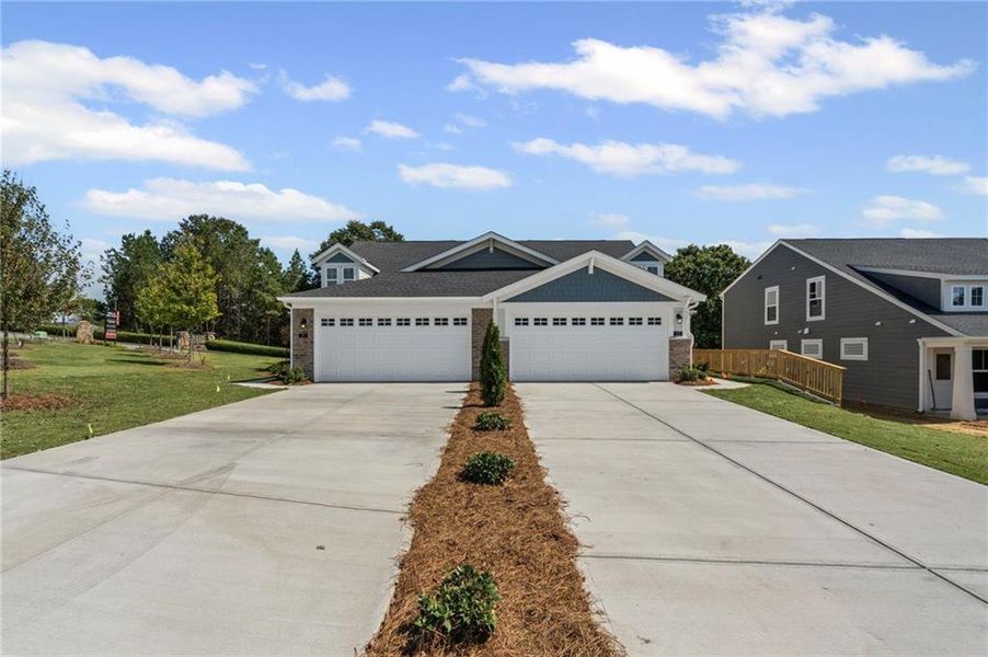 Front exterior of a new home in Villas at Gold Creek, Dawsonville, GA, highlighting curb appeal (Image 18).