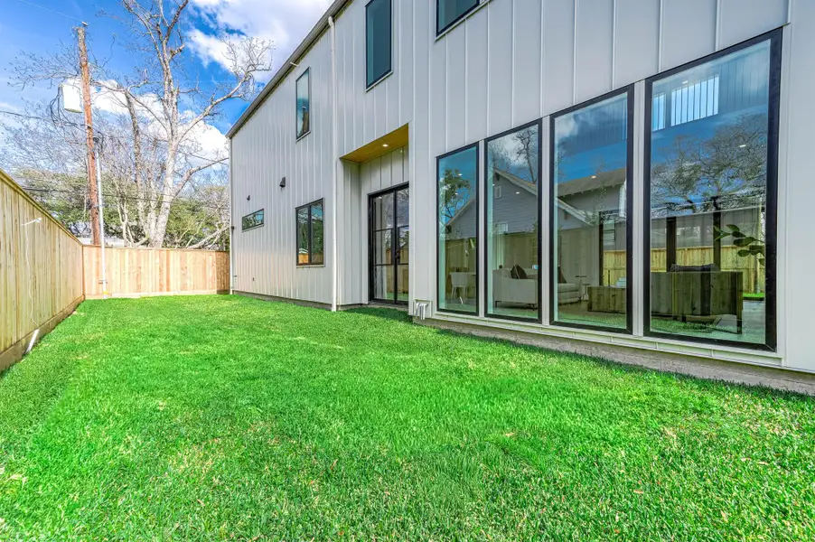 Exterior details and patio area of a home in , Houston (Image 3).