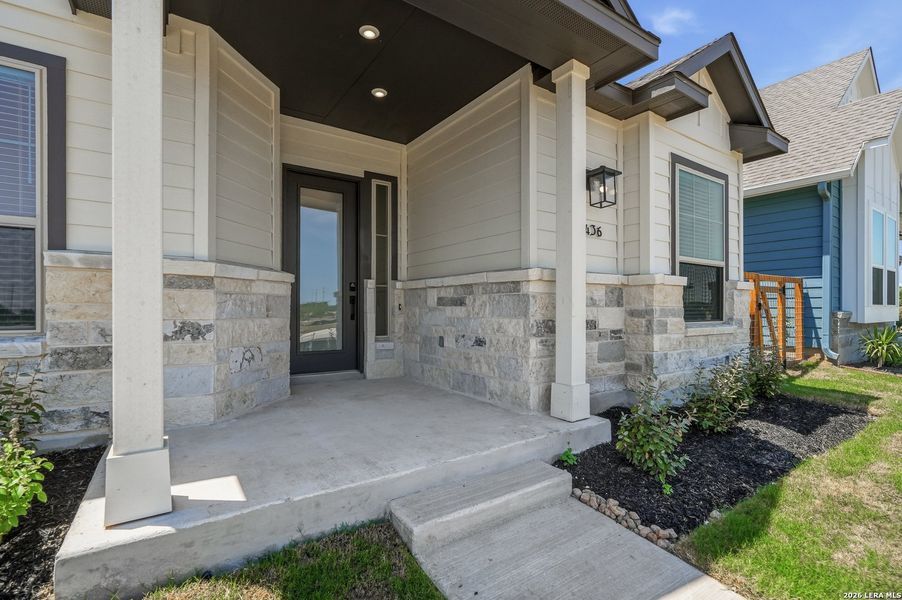 Exterior details and patio area of a home in The Crossvine, Schertz (Image 4).