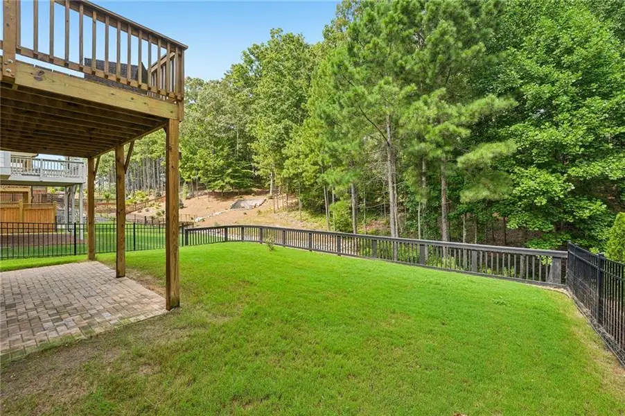 Exterior details and patio area of a home in Lakeside at River Green, Canton (Image 23).