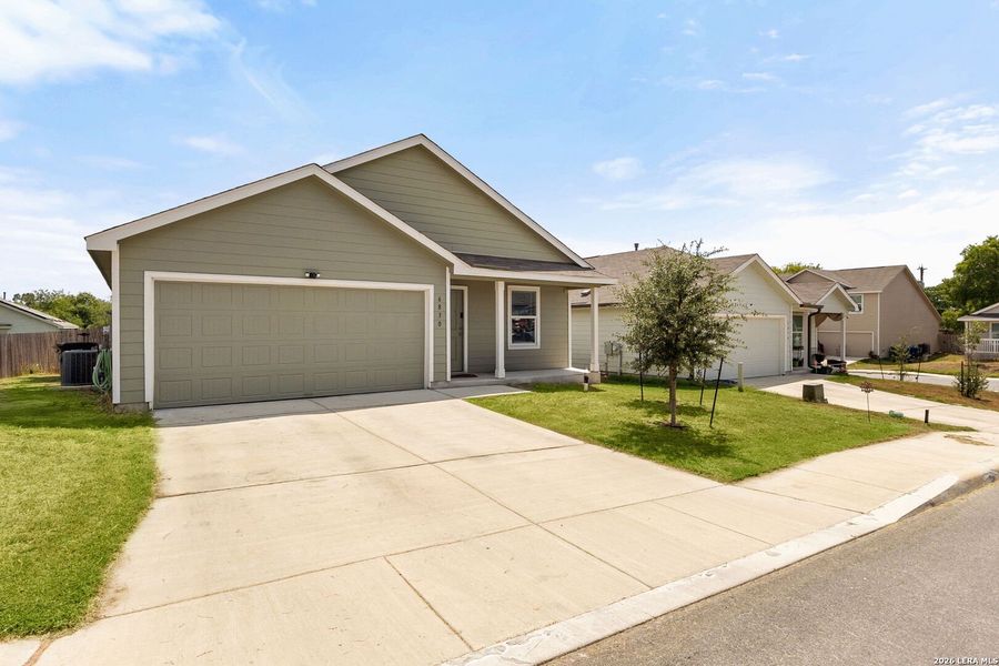 Front exterior of a new home in Vista Point, San Antonio, TX, highlighting curb appeal (Image 19).