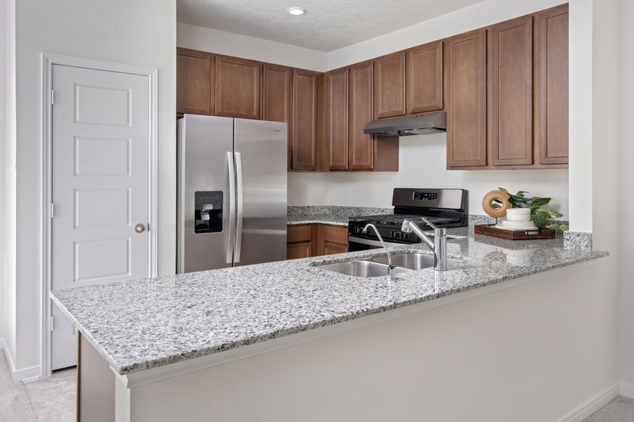Representative furnished interior of a home built from the 1271 by KB Home in Glenwood Forest, Conroe (Image 5).