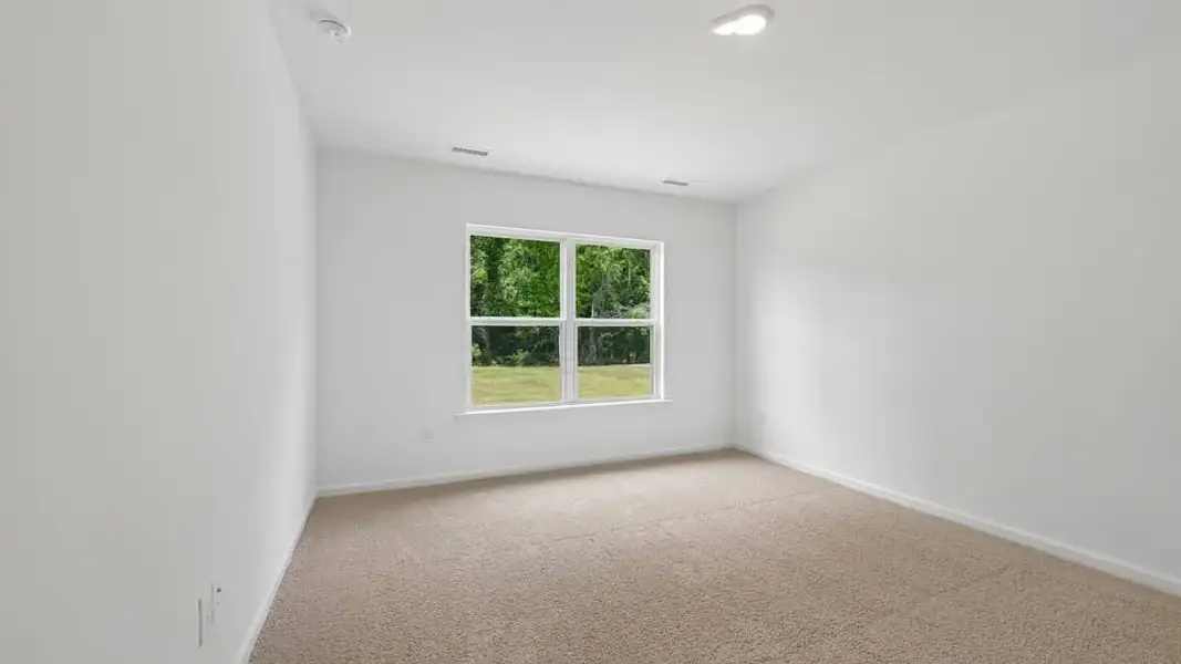 Spacious, unfurnished interior of a new home in Mangum Farms, Stem (Image 24).