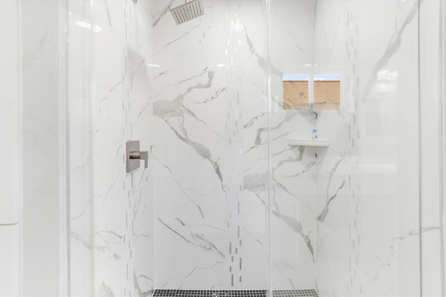 Fully tiled stand alone shower in the primary en suite Fully tiled stand alone shower in the primary en suite