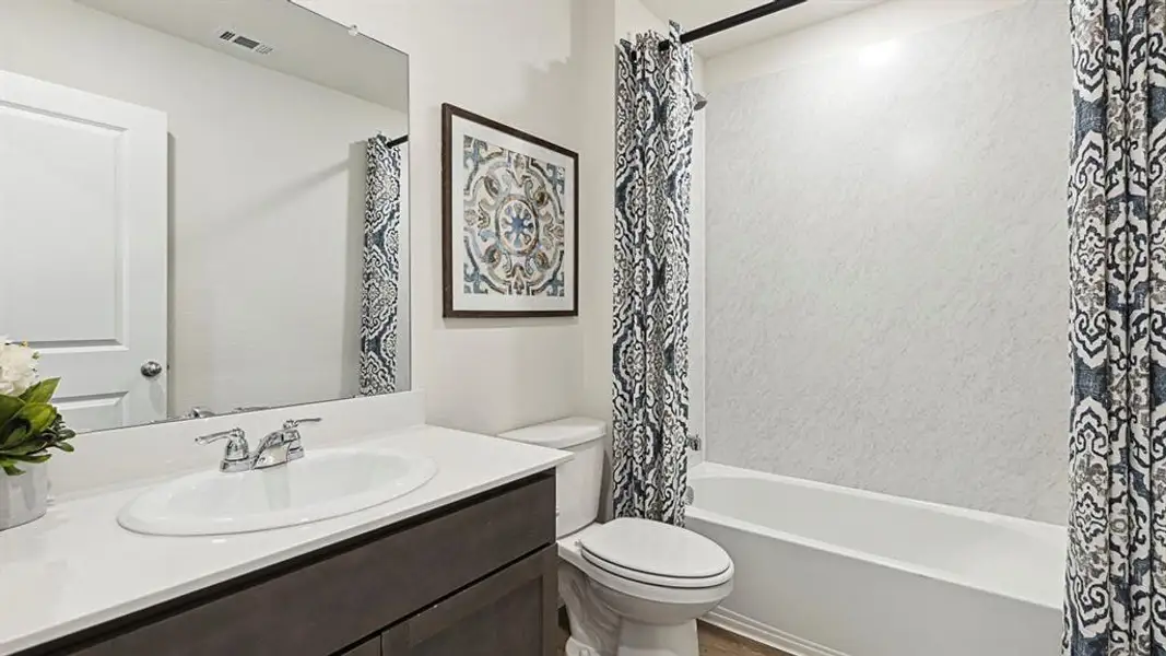 Bathroom with vanity and shower / bath combo Bathroom with vanity and shower / bath combo