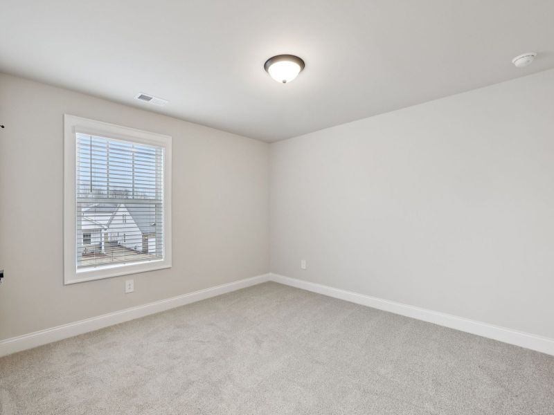 Spacious, unfurnished interior of a new home in Vines at Mill Creek - Estate Series, Braselton (Image 19).