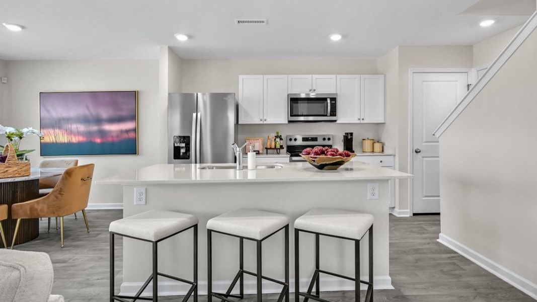 Furnished interior view inside a new home in North Village Townes, Greensboro (Image 7).