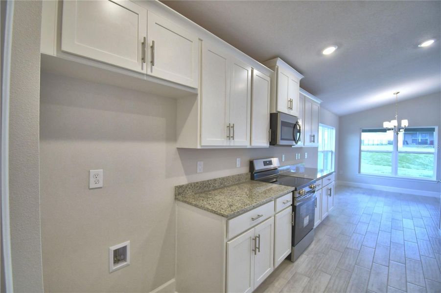 Furnished interior view inside a new home in Lake Juliana Estates, Auburndale (Image 6).