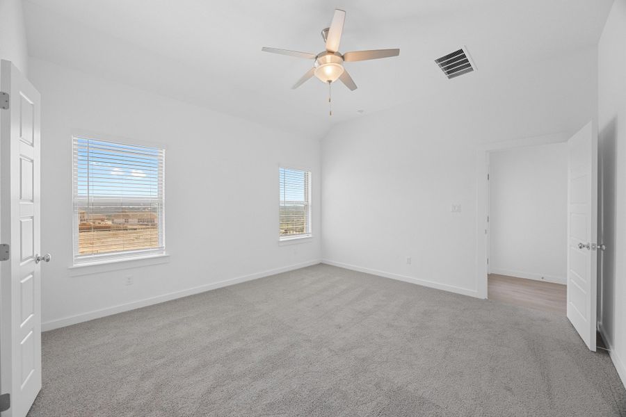 Primary Suite in the Pecan II home plan by Trophy Signature Homes – REPRESENTATIVE PHOTO Primary Suite in the Pecan II home plan by Trophy Signature Homes – REPRESENTATIVE PHOTO