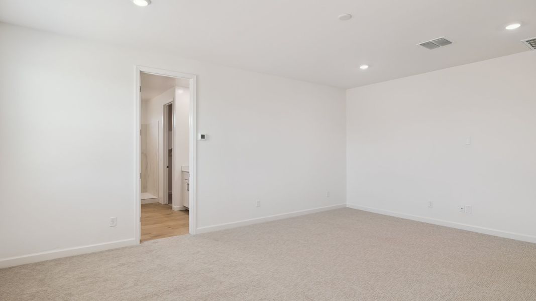 Spacious, unfurnished interior of a new home in Zanjero Pass, Waddell (Image 36).