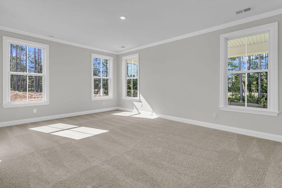 Spacious, unfurnished interior of a new home in Tidewater at Lakes of Cane Bay, Summerville (Image 18).